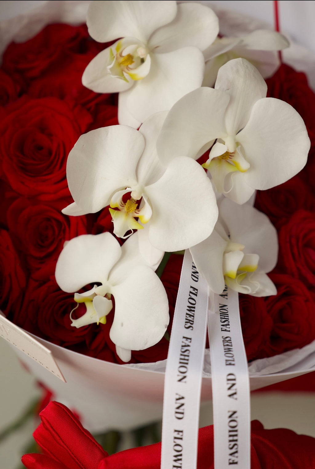 Orchid In Red Bouquet